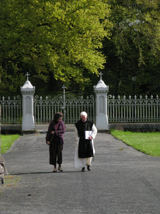 Dom Laurence and Connie walking to the Abbey library